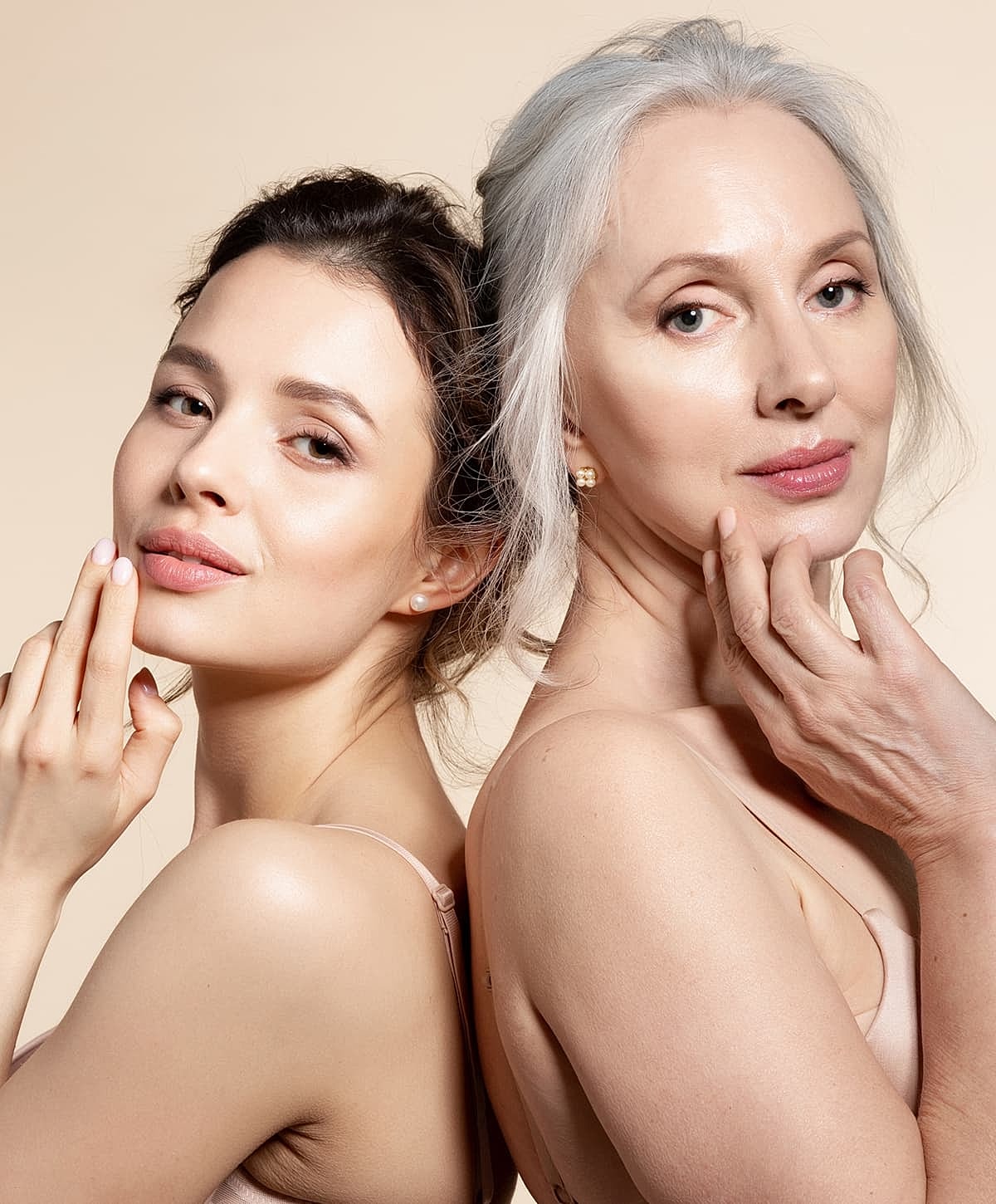 Two women posing together, showcasing different ages.