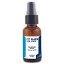 Facial serum in a brown glass bottle.