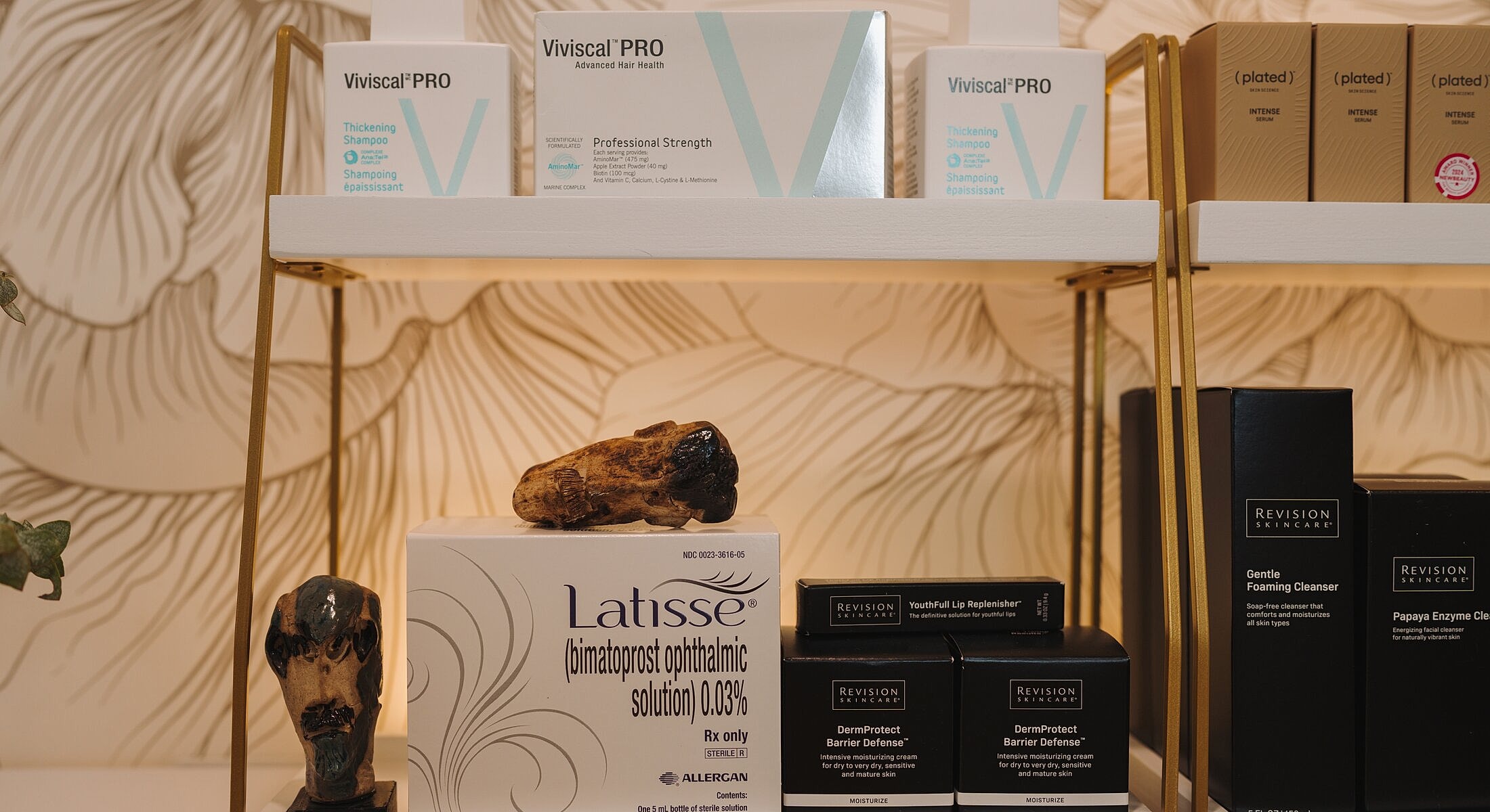 Skincare and haircare products on display shelf
